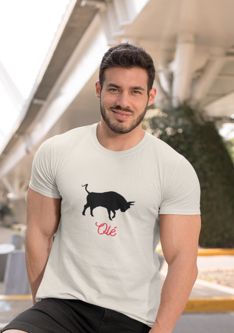 t-shirt-mockup-featuring-a-fit-man-in-tee-that-depicts-a-black-toro-with-word-ole-at-airport.png