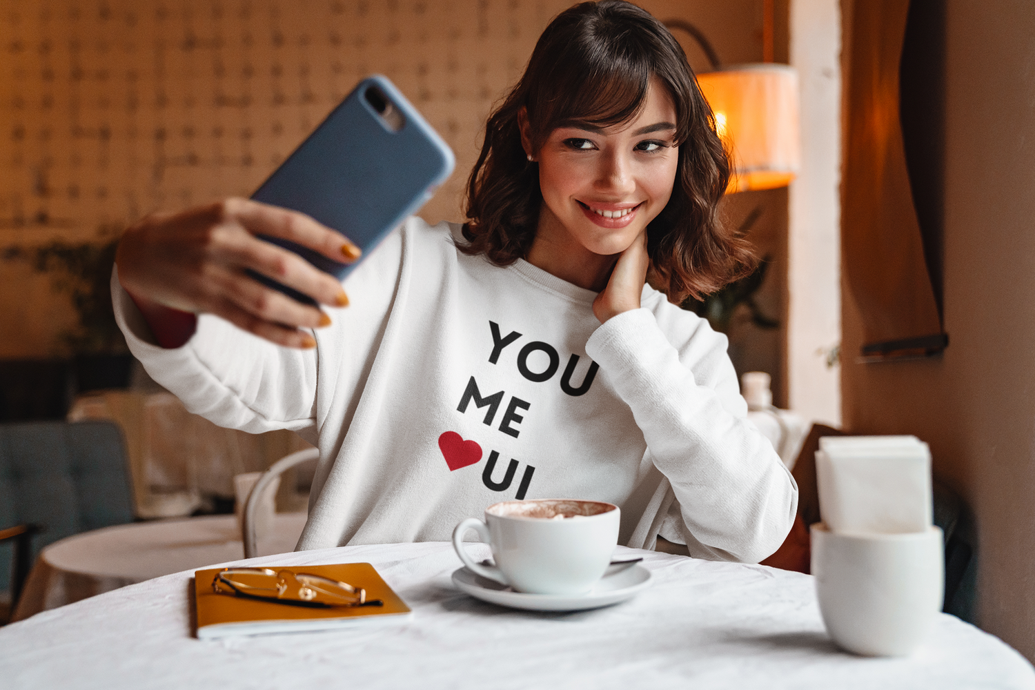 You-me-oui-crewneck-sweatshirt-mockup-featuring-a-woman-taking-a-selfie-39828-r-el2.png